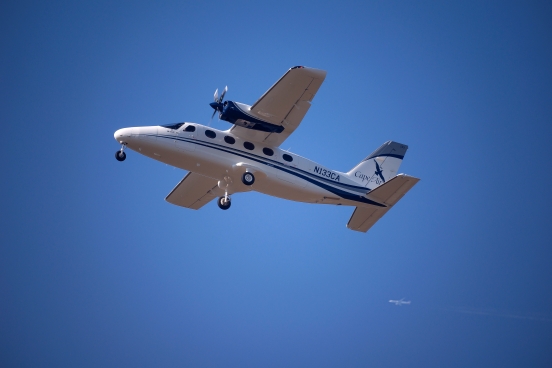 cape air plane in flight against blue sky