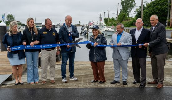 Local Officials from the Town of Islip cut the ribbon in front of the marina