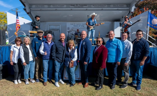 supervisor with local elected officials at apple fest