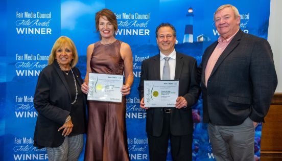 Group photo of the Supervisor and Employees accepting FOLIO Award