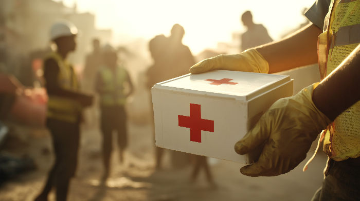 donate-disaster donante to disaster relief image of hands holding med box
