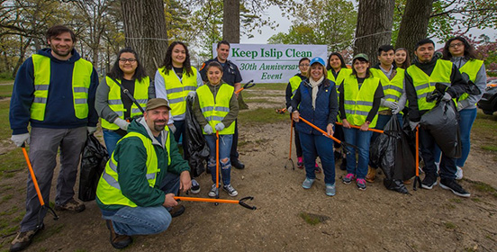 Supervisor Carpenter joins Nancy Cochran the Executive Director of Keep Islip Clean, and volunteers to clean up Ross Park in Brentwood