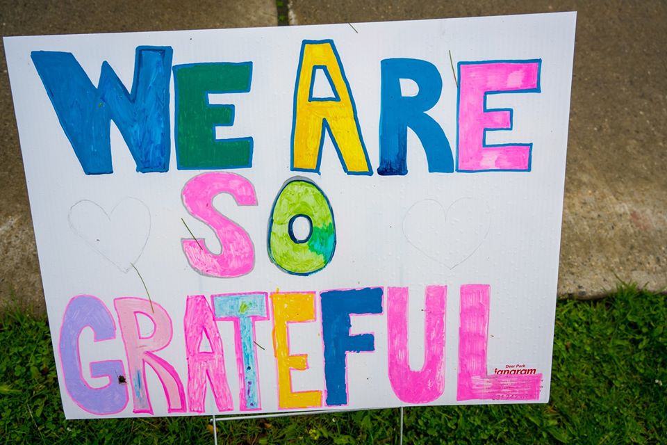 sign reads 'we are so grateful" 