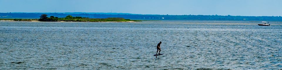 Paddle Boarder out in the bay