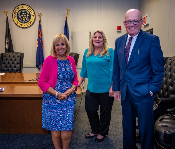 Supervisor Angie Carpenter stands with James Bowers and Julia McGibbon from the Town of Islip Community Development Agency joined to discuss the emergency rental program offered to help residents of the Town.