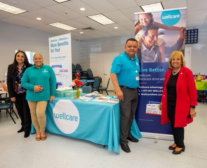 Supervisor visits with Wellcare booth