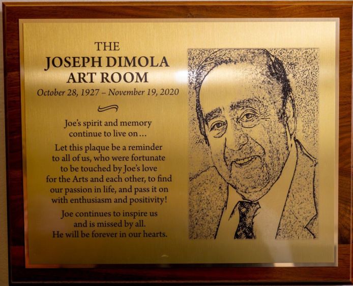 Commeorative Plaque bearing the likeness of Joseph DiMola and some info.