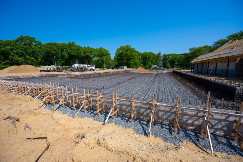 wideshot showing the expanse of the eventual pool, with rebar framing