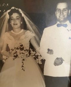 vintage photo of Anthony and his Wife as they walk side by side on their Wedding Night, 71 years ago