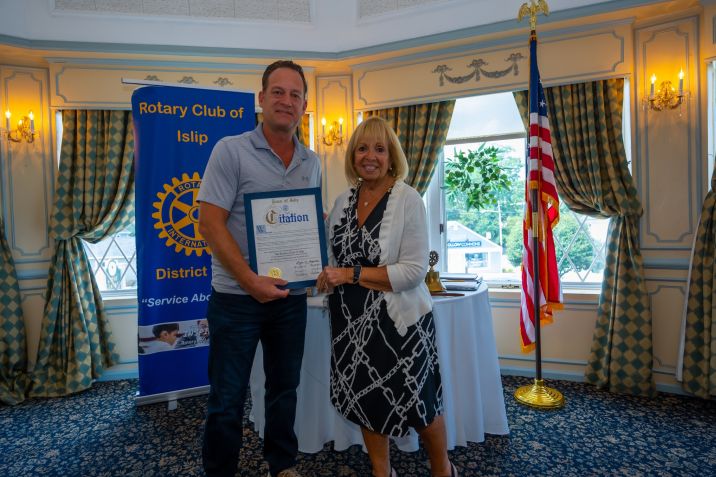 Member of Islip Rotary presented with Citation by Supervisor