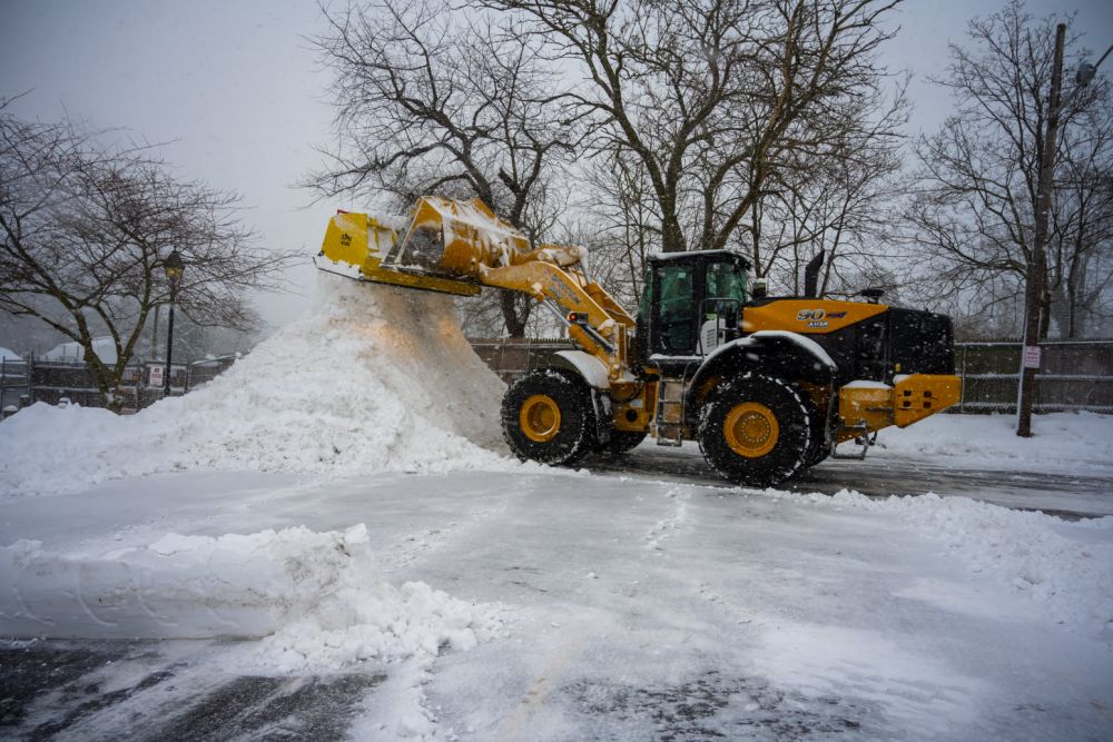 islip bulldozer moves snow