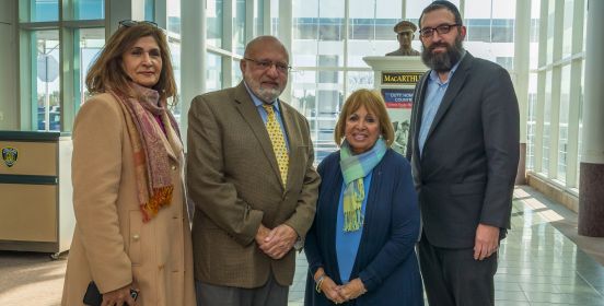  Dr. Hafiz Rehman Rabbi Shimon Stillerman and Supervisor Carpenter pose for a group photo in the main lobby of MacArthur Airport.