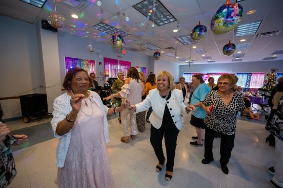 Supervisor Dancing with Seniors
