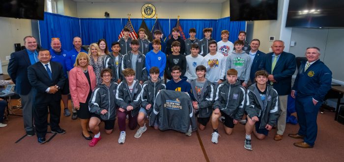 West Islip Boys Varisty Soccer Team in group shot at Town Hall